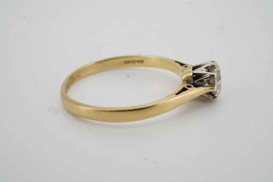 A modern 19ct gold and solitaire diamond ring, the stone weighing 0.50ct, size O, gross weight 2.2 grams.
